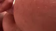 3 mecs en baise gay sur une plage naturiste