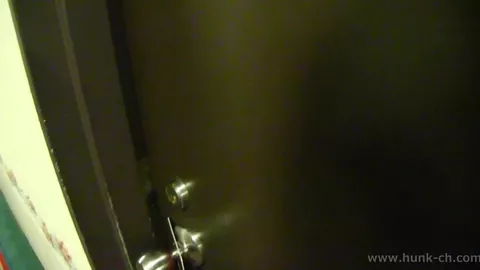 muscular man using a coin laundry