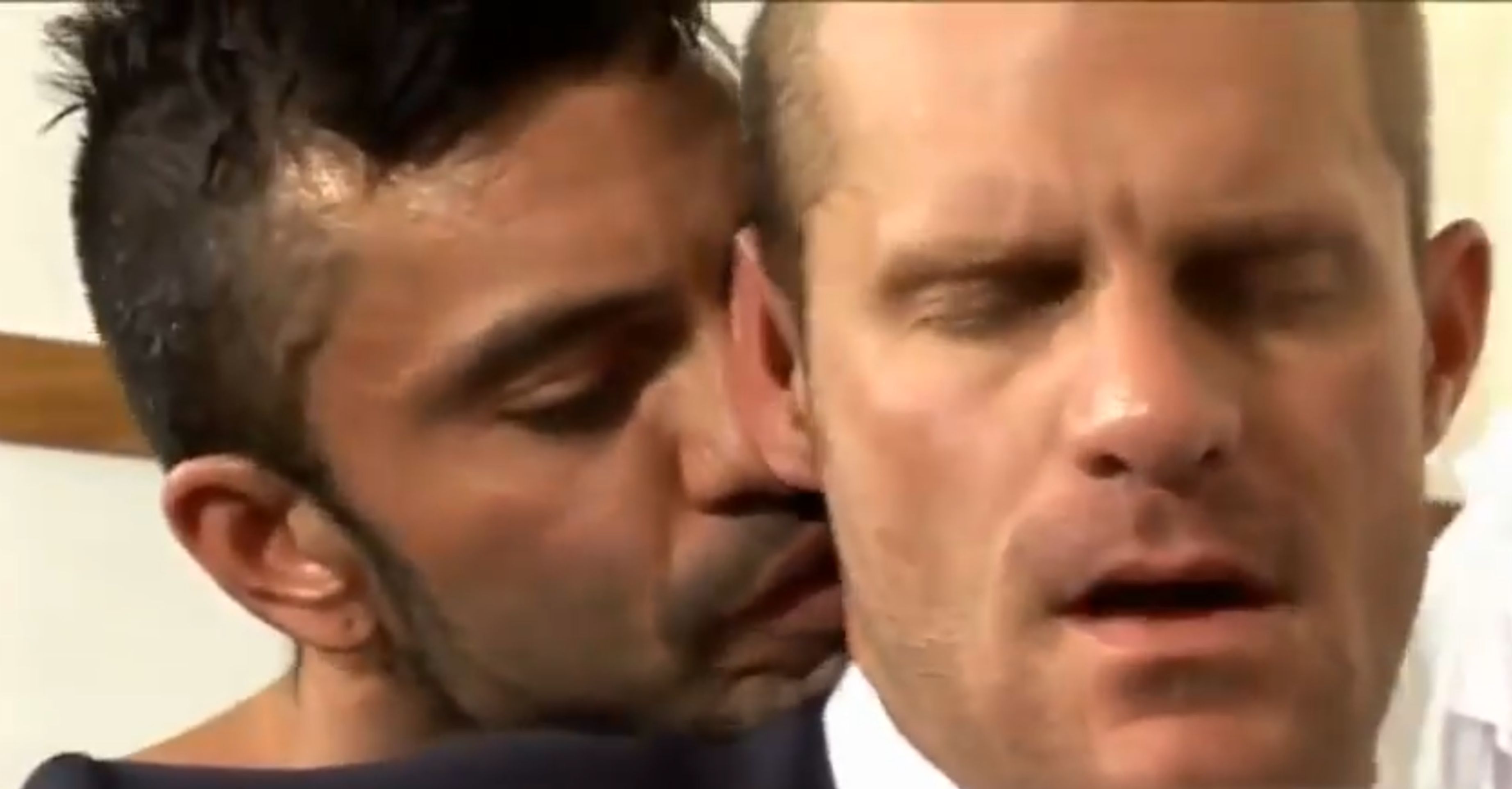 Suited Rogan and Landon in a locker room