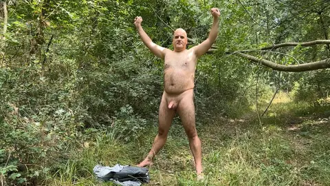 Zolee undresses in the forest and then cums