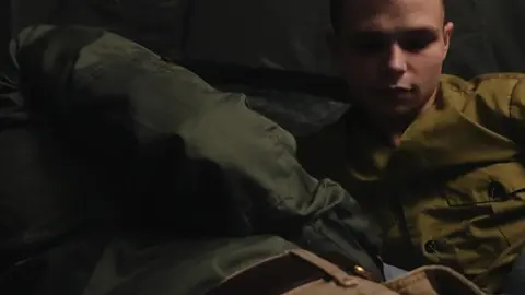 A Scout And His Scoutmaster Being Sneaky In The Tent