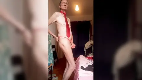 nude but chic wearing a red tie and sexy underwear