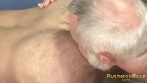 Grey-haired daddy fucking a hairy stud