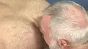 Grey-haired daddy fucking a hairy stud
