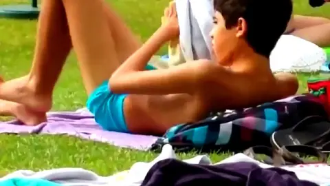 Teen Twink Jerks Off in Public Outside A Pool, And Cums in His Swimsuit Then He Licks