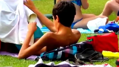 Teen Twink Jerks Off in Public Outside A Pool, And Cums in His Swimsuit Then He Licks