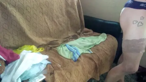 Male slut paints her nails