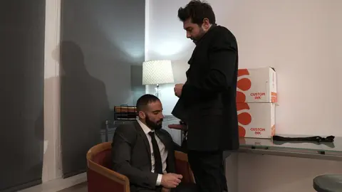 Boss fooling around with his employee after work